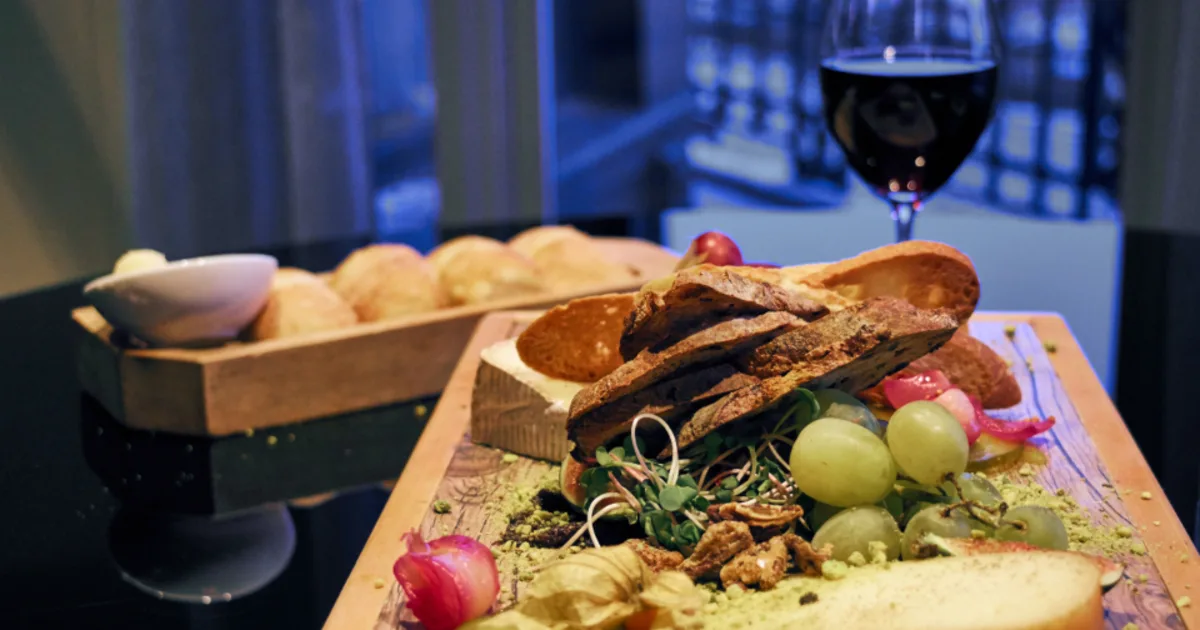 Grazing board with cheeses and fruit